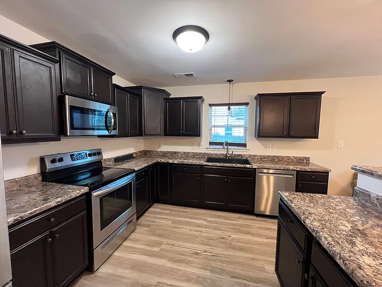 310 Landon Ln — Photo 32