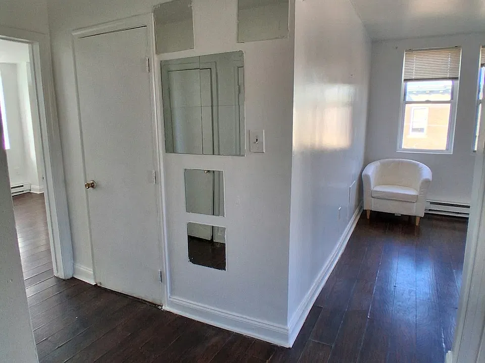 Hallway leading to living room & bedrooms.