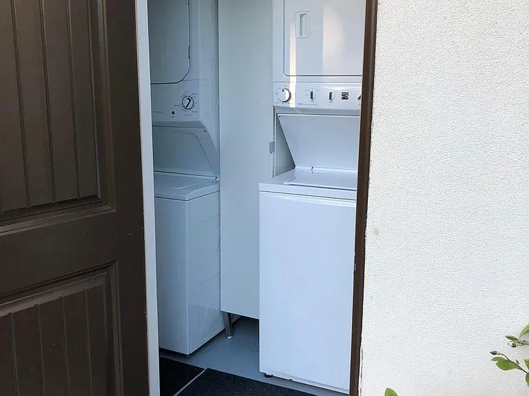 laundry room, tenant uses washer/dryer on the left
