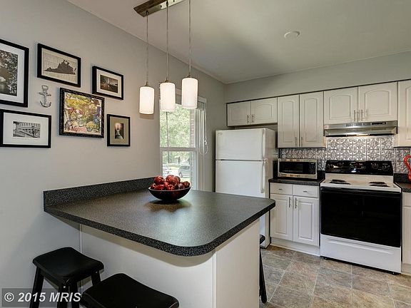 Natural light abounds in Kitchen