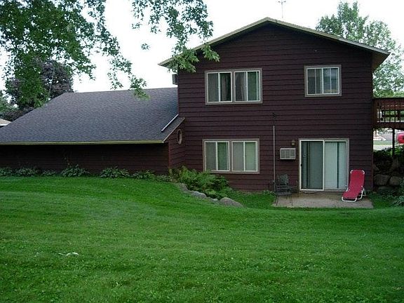 Large fenced in backyard with deck out sliding doors off kit