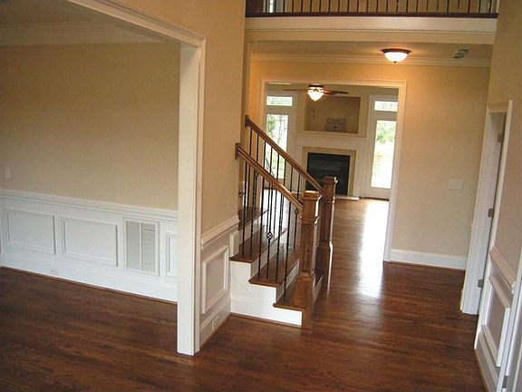 Upon entry into the two-story foyer you have the dining room on the left and h