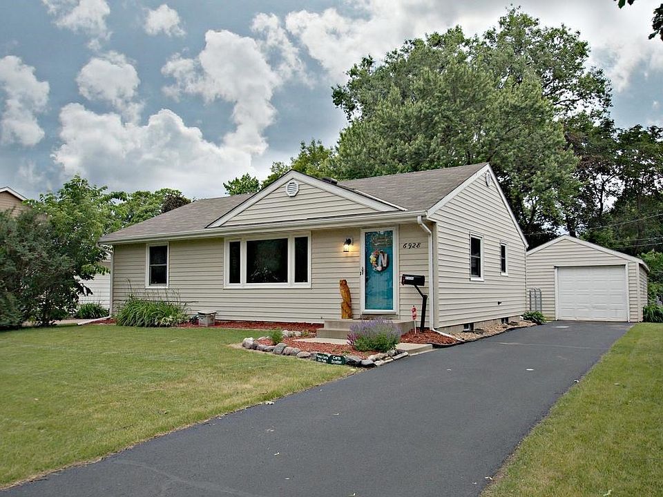 Talk about curb appeal! Maintenance free siding, newer windows, freshly sealed driveway, handsome landscaping and bright front door scream buy me!