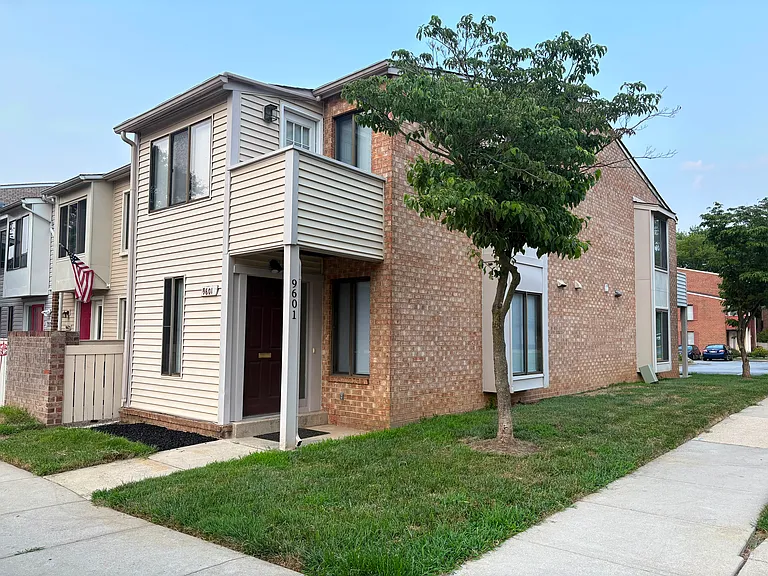 Front view with lots of natural lighting! Parking spot at your front door!