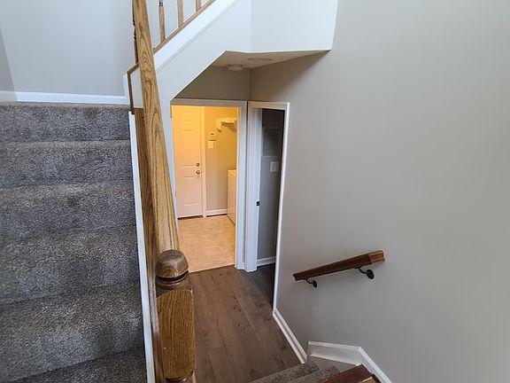 Main entrance foyer. 4th bedroom entrance and Laundry room.