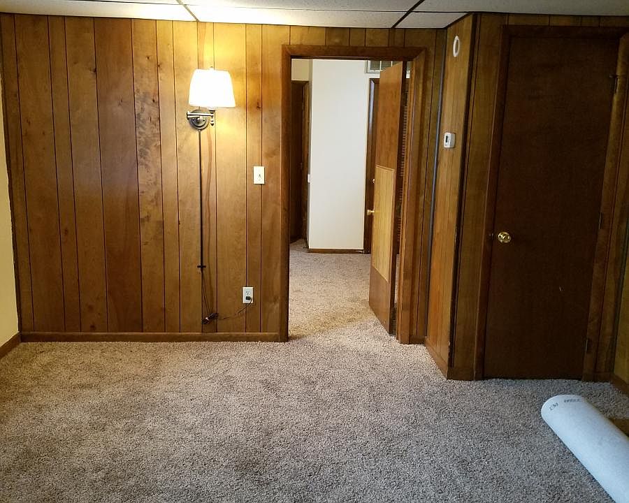 newly carpeted spacious living room 