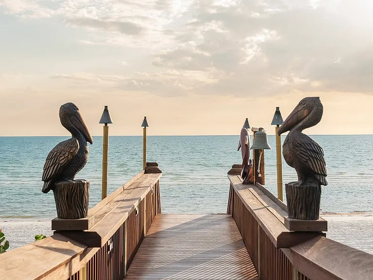8 minute walk to the Naples top ranked waterfront restaurant, Gumbo Limbo at The Ritz Carlton Beach Resort