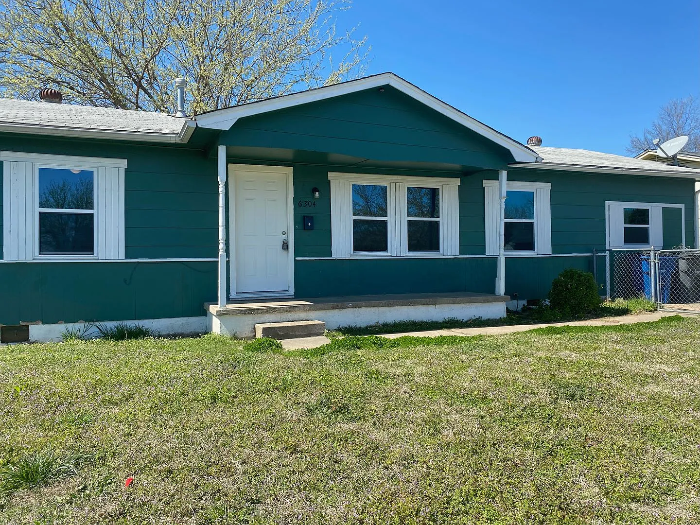 4-Bed, 2-Bath Beauty with Tile Showers & Fenced Yard! — Photo 1
