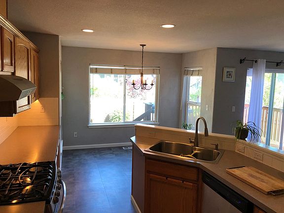 Kitchen with nook & open dining area