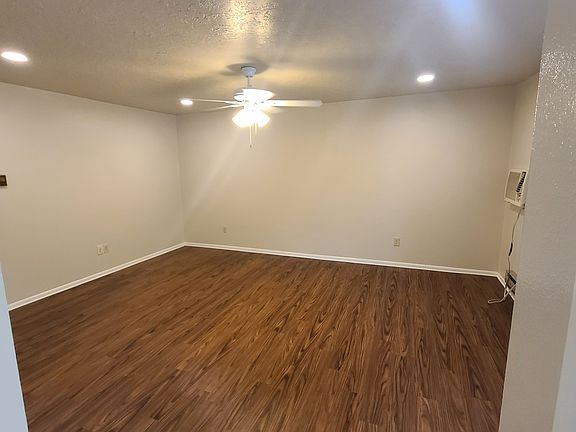 Living Room with Large Picture Window, Ceiling Fan