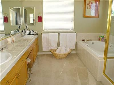 There's THREE full bathrooms in this FIVE bedroom house!
