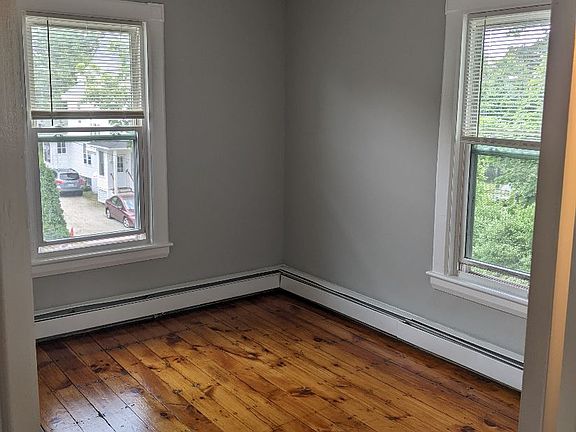Bedroom with wood floors