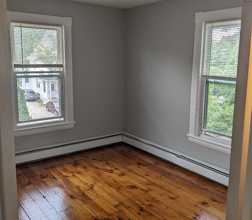 Bedroom with wood floors