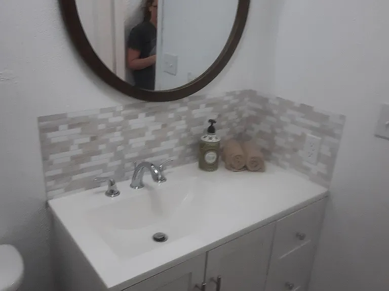 new bathroom vanity, backsplash and mirror