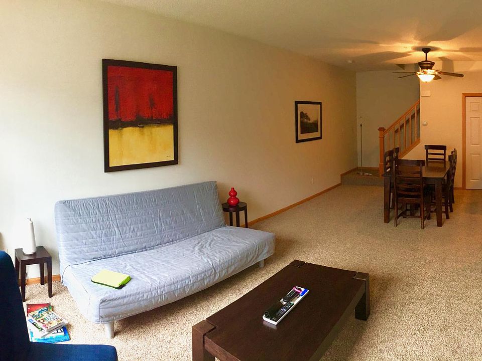 Open floor plan, street-level living/dining room.
