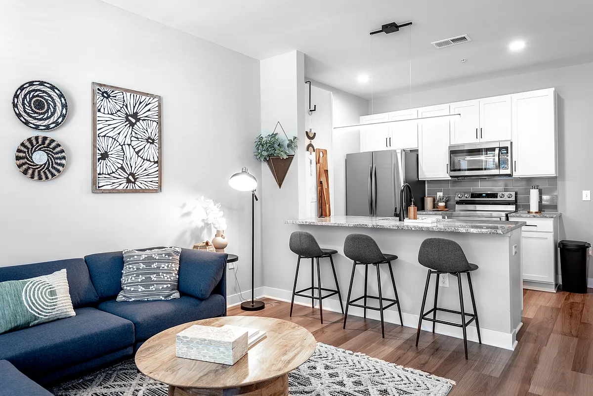 The Thomas Model Living Room and Kitchen - The Thomas at GVX
