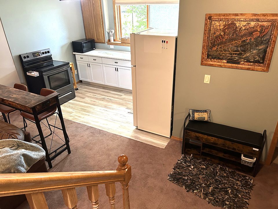 Down the steps into living area.