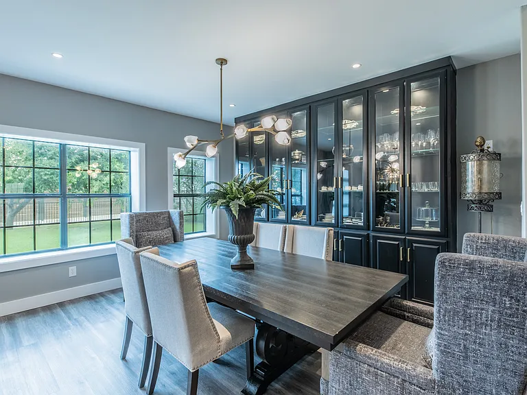 Sophisticated dining with high-end finishes and custom cabinetry.