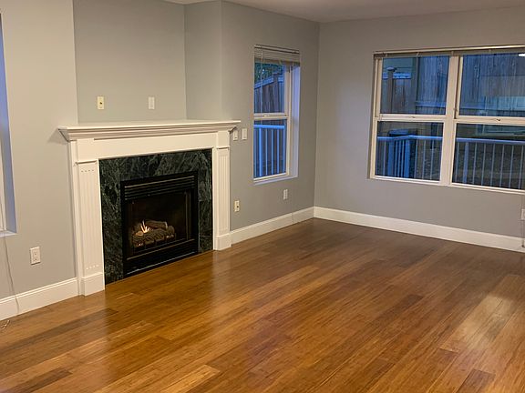 104 Living room.
Hardwood flooring and gas fireplace.