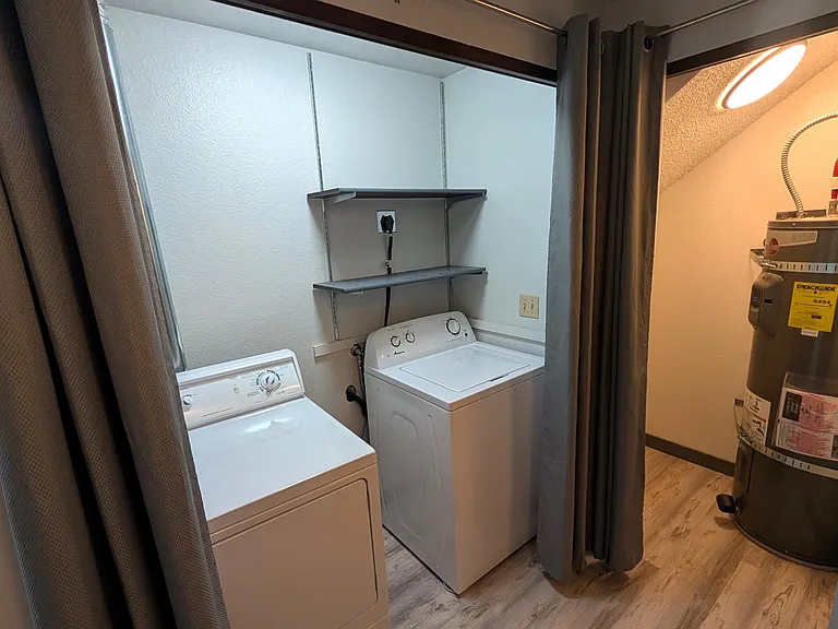 Washer, Dryer, Water heater closet, and main water shut off.