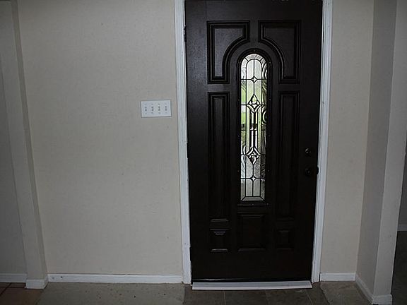 Whether you're looking at the outside of the home or looking from the den to the inside of the front