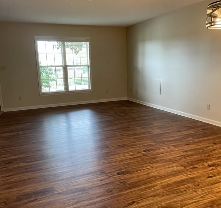 New-like LVT flooring in living room/dining room