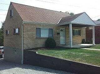 Lovely brick cape cod, 1 1/2 story.