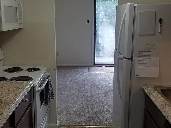 view through kitchen to living room