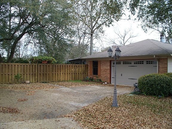 New garage door, fence and gate.