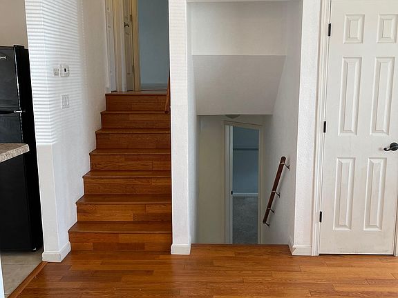 The levels of the house split off the living room. Master bedroom, 2nd bedroom, full bath with tub and shower, and linen closet on the upper level; 3rd and 4th bedroom, laundry, and full bath with tub and shower on lower level.