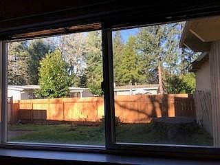 View from Second Bedroom to Fenced Yard