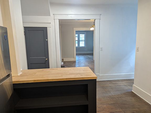 kitchen open to dining and living