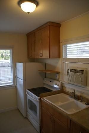 1st image of 728 104th Ave N Unit E