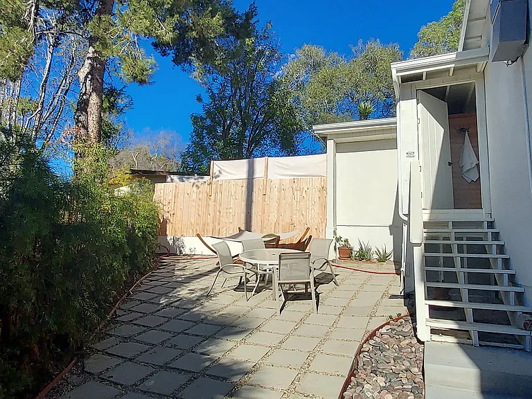 Access your private yard through your spa courtyard and down the steps