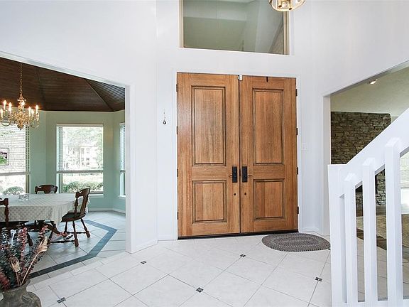 From this view of the entry you'll find the Formal Dining Room to the left, and the Living Room on the right