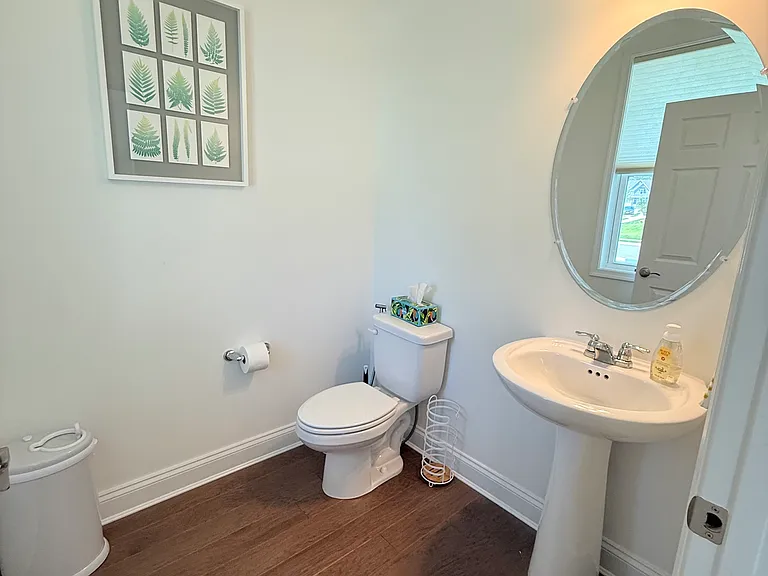half bathroom off of foyer
