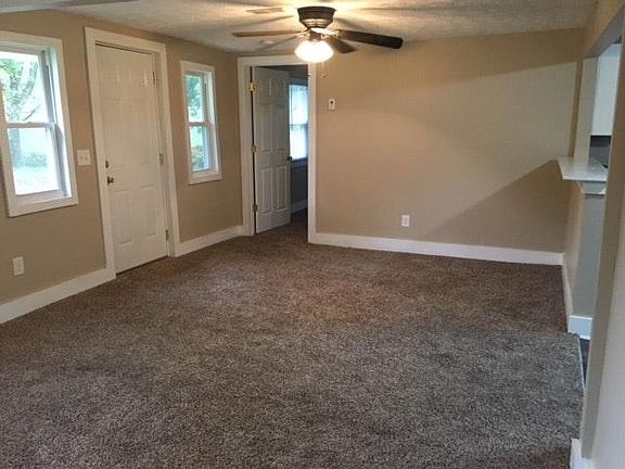 Living room & bedroom with ceiling fans