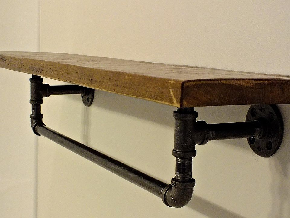 Reclaimed wood and pipe accents throughout.