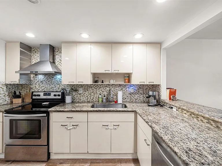 100 Edgewater Dr #329 — Photo 8