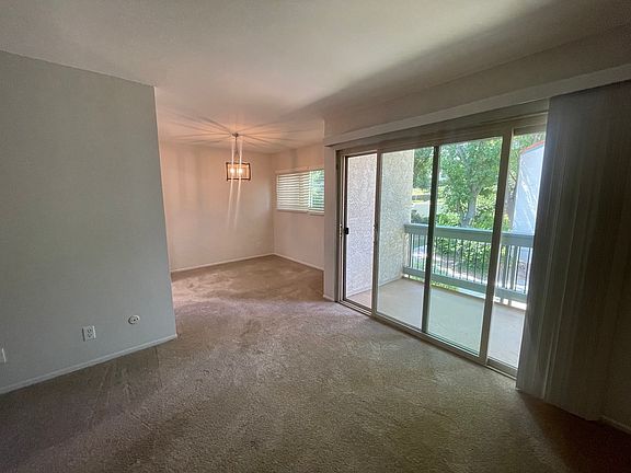 Dining area next to balcony.