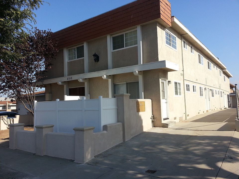 Driveway showing backdoor off of Kitchen.