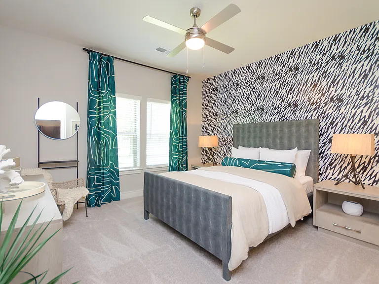 Retreat to a bedroom built for relaxation.