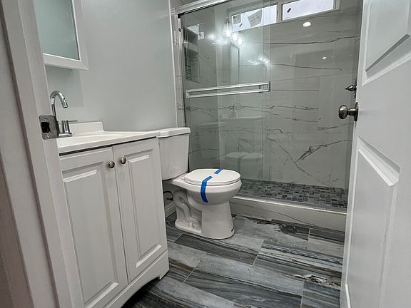 Gorgeous, tiled bathroom.