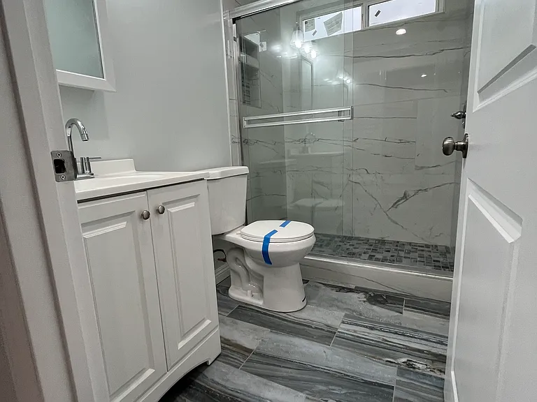 Gorgeous, tiled bathroom.