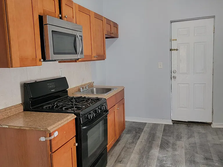 5208 Harlan St — Photo 2