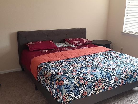 Main bedroom with a King size bed