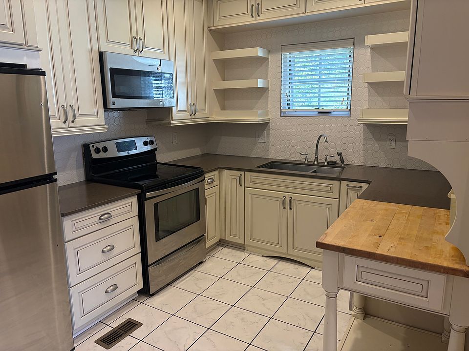 Kitchen has soft close drawers, doors, and garbage disposal