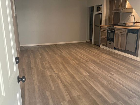 Photo from the front door of living/kitchen, main room. 12 ft x 28 ft.