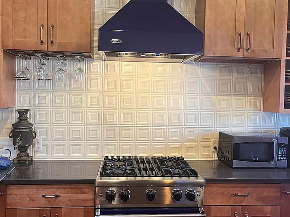 Viking gas stove and hood, microwave