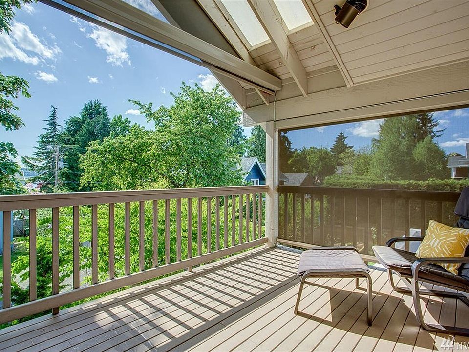 Lovely landscaping, front porch, great curb appeal!